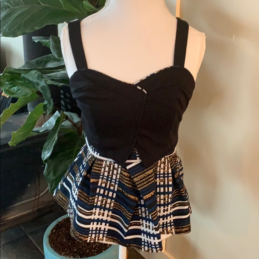 Adorable Delatta peplum top